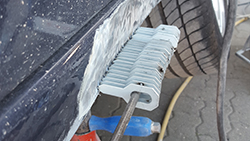 Pulling out another dent!